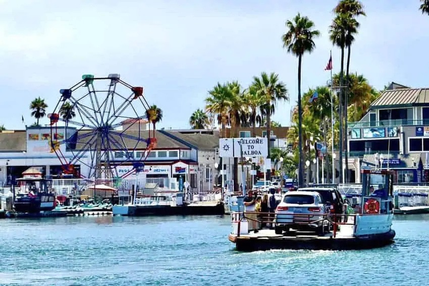 Scenic view of Balboa Island in Newport Beach, California, featuring charming coastal homes and waterfront surroundings.